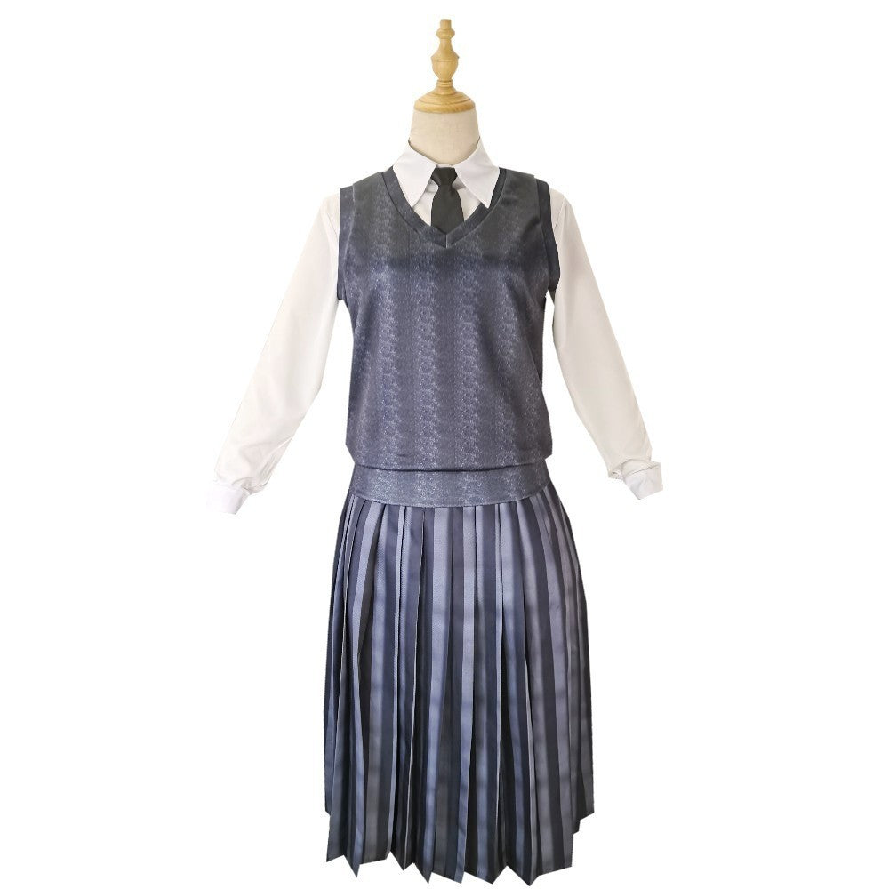 School uniform Costume with gray vest and pleated skirt on a mannequin against a white background