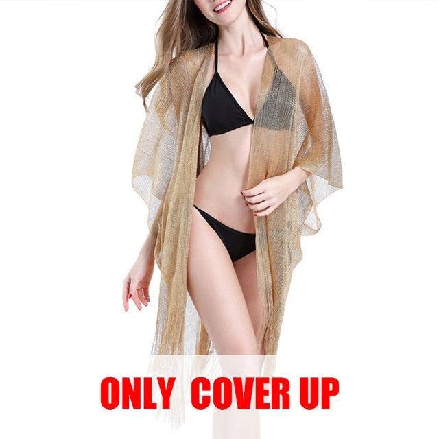 Woman wearing a black bikini with a dusty sand cover-up on a white background, with text 'ONLY COVER UP' in red.