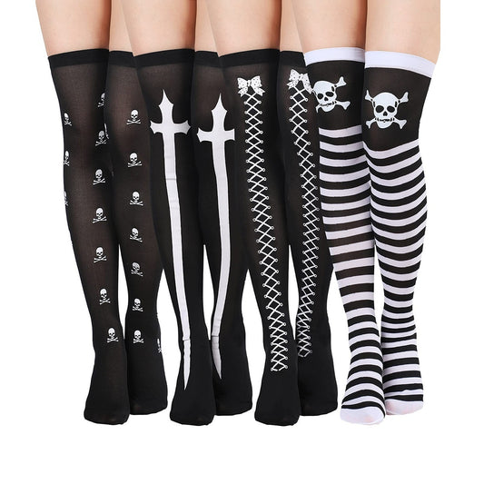 Set of black and white knee-high socks with various designs on a white background